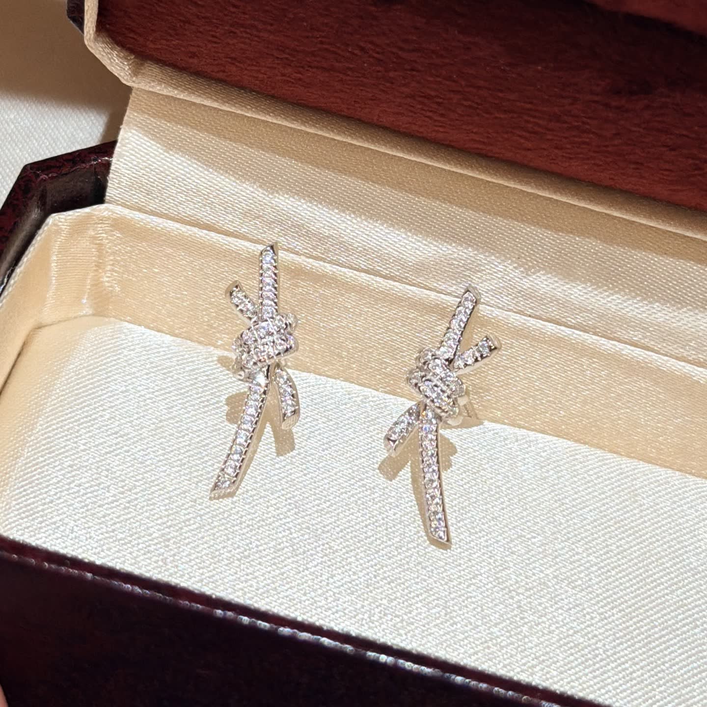 Tiffany & Co Elegant Silver Rhinestone Bow Earrings